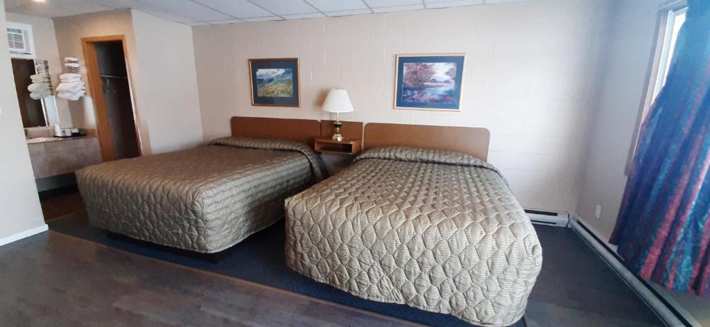 Postel nebo postele na pokoji v ubytování Mary's Motel