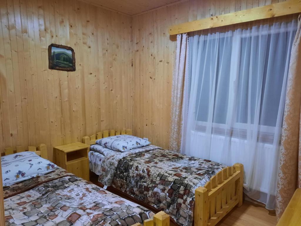 Letto o letti in una camera di Cube