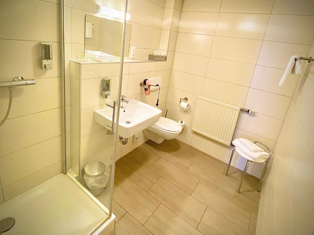 Koupelna v ubytování Meister BÄR HOTEL Am Wald