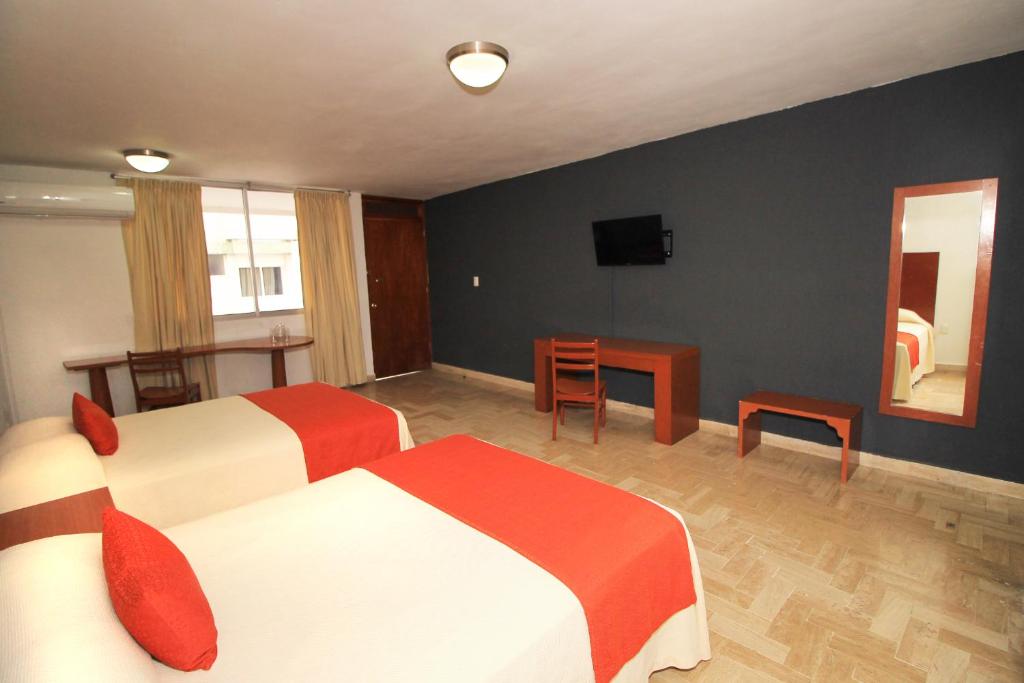 TV a/nebo společenská místnost v ubytování Hotel Central
