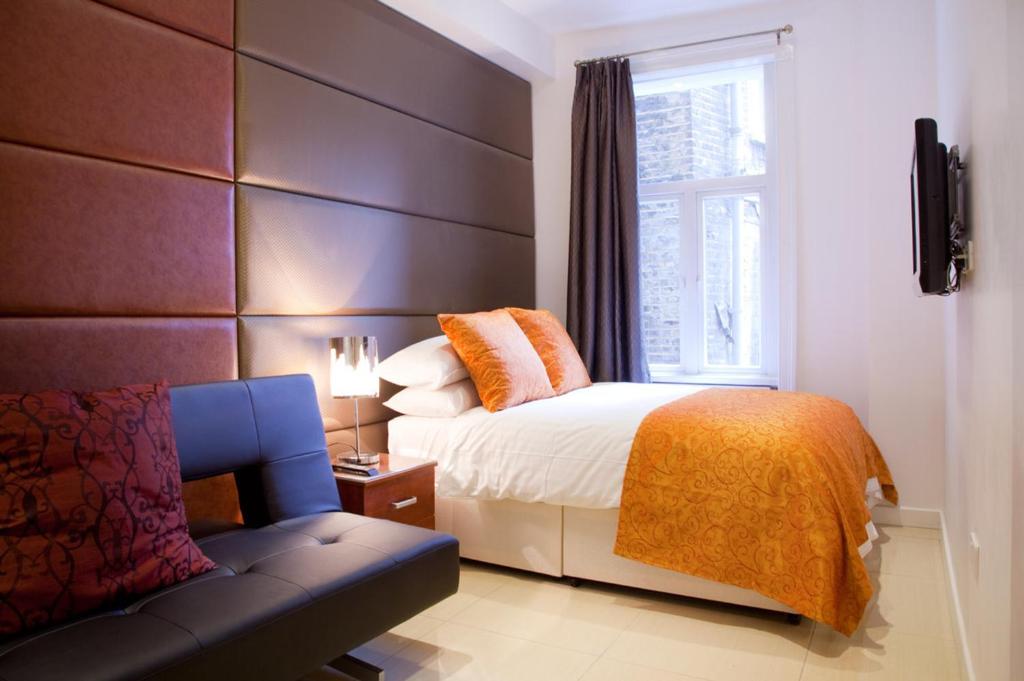 Postel nebo postele na pokoji v ubytování City Inn Russell Square