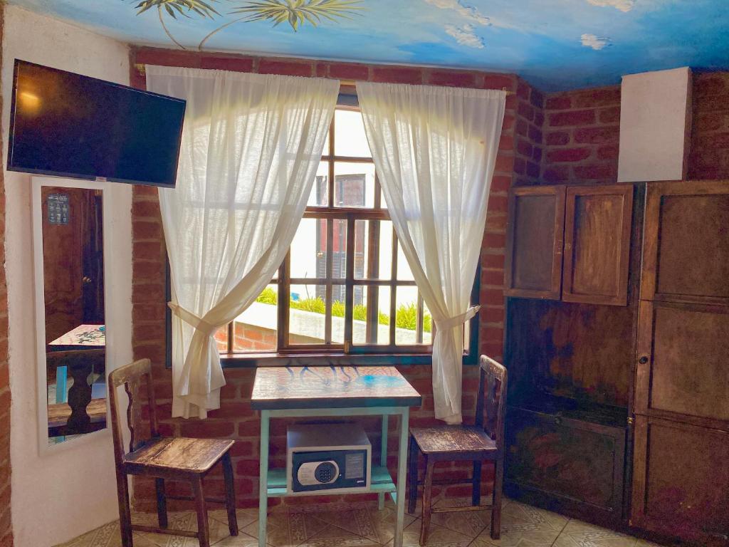 TV a/nebo společenská místnost v ubytování Great Hostels Backpackers