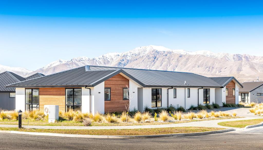 a rendering of a house with mountains in the background at Star River in Lake Tekapo