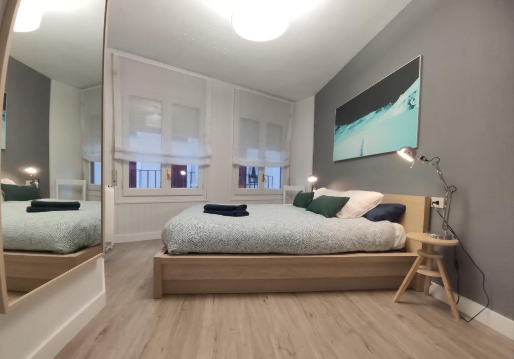 Postel nebo postele na pokoji v ubytování VUT Anayet