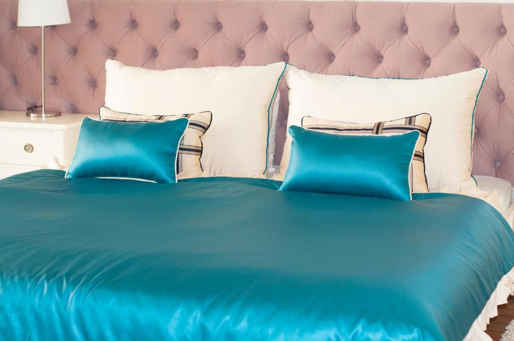 Postel nebo postele na pokoji v ubytování Boutique Vila Paradis
