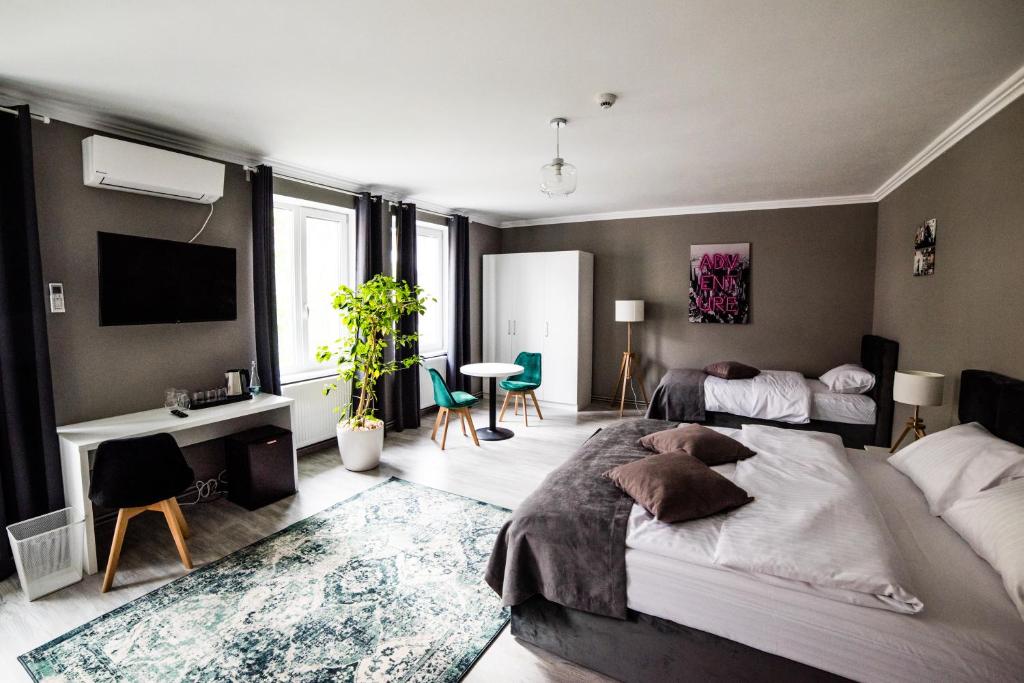 Postel nebo postele na pokoji v ubytování COMPLEX LIVING