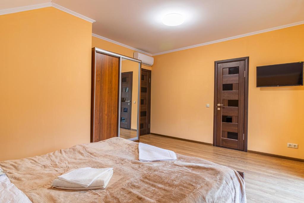 Postel nebo postele na pokoji v ubytování Nikol