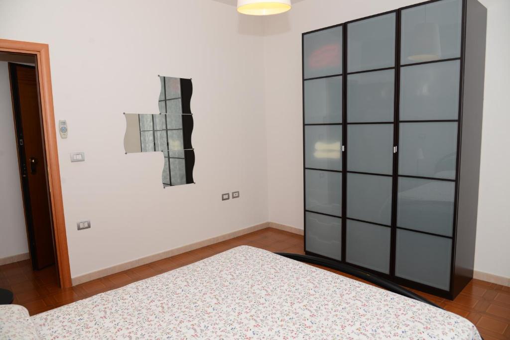 Postel nebo postele na pokoji v ubytování Jonico Guest House