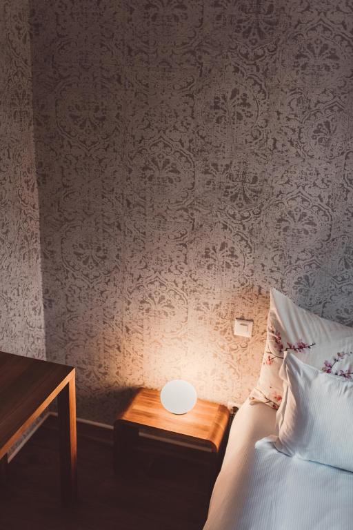 Postel nebo postele na pokoji v ubytování Hotel Villa Emden