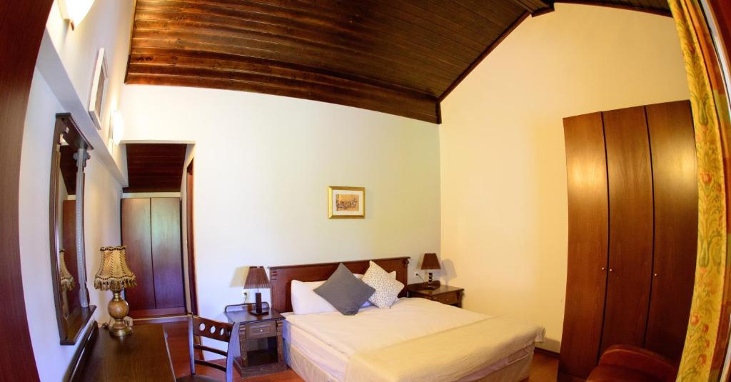 A bed or beds in a room at Self Catering Chalet Kulina