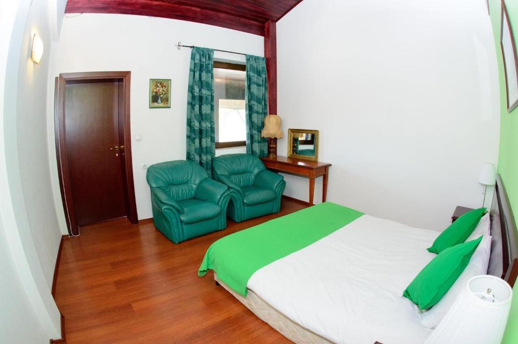 A bed or beds in a room at Self Catering Chalet Kulina