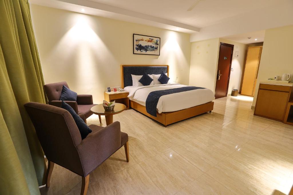 Postel nebo postele na pokoji v ubytování Zip By Spree Hotels Hyde Goa