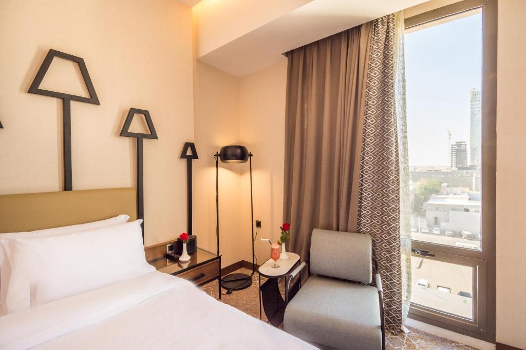 Llit o llits en una habitació de Grand Plaza Hotel - KAFD Riyadh