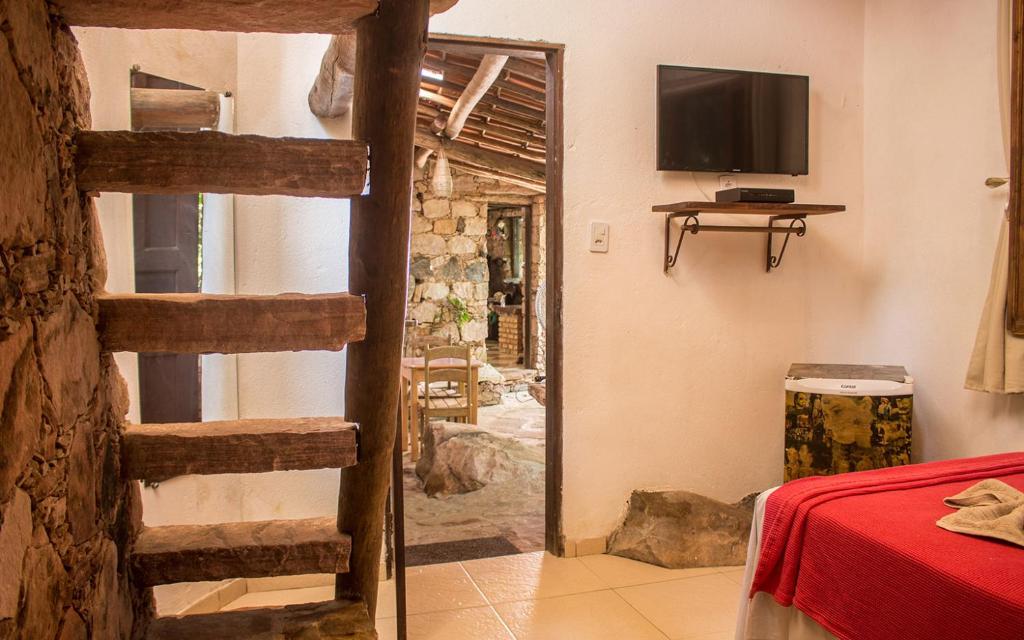 Postel nebo postele na pokoji v ubytování Pousada Flor de Açucena
