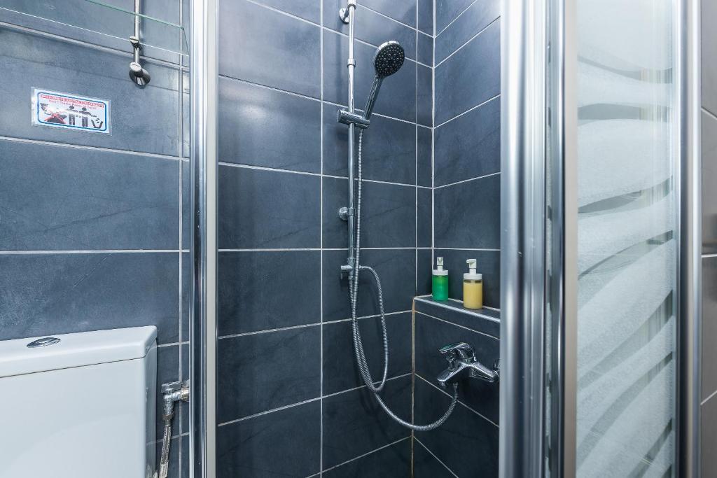 Koupelna v ubytování Amazing Apartment Pallini - Near Airport & Metro