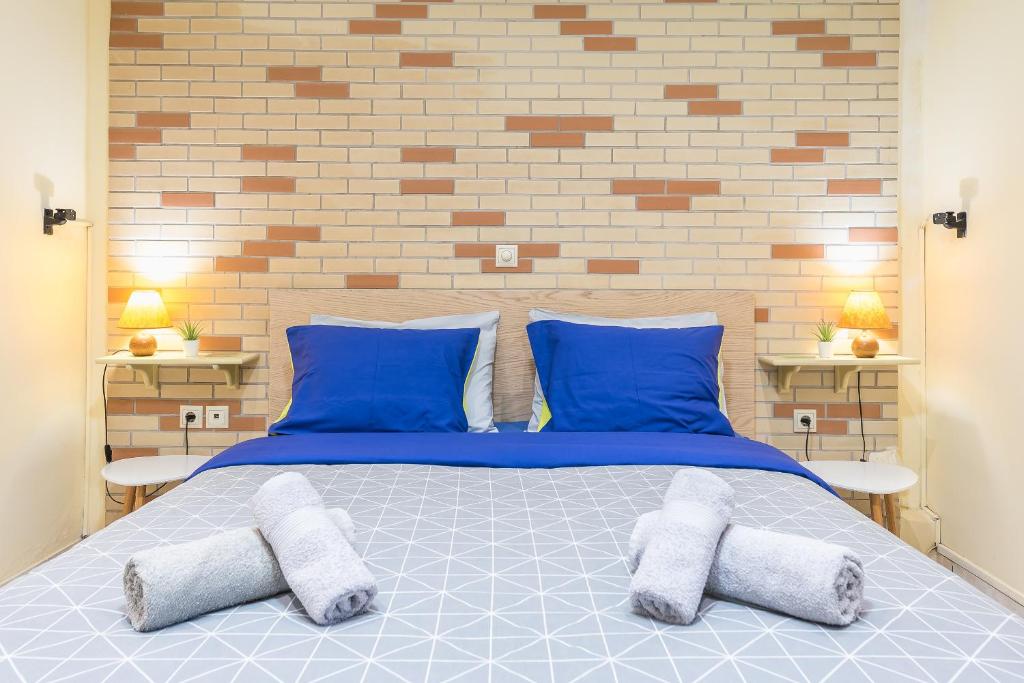 Postel nebo postele na pokoji v ubytování Amazing Apartment Pallini - Near Airport & Metro
