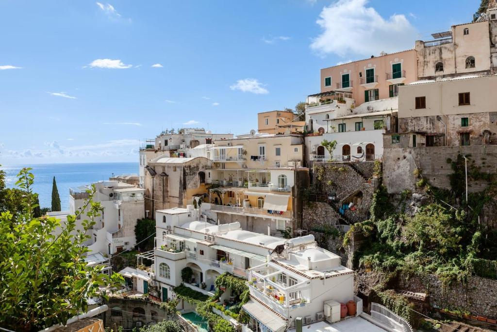 a group of buildings on the side of a mountain at La Casetta in Positano
