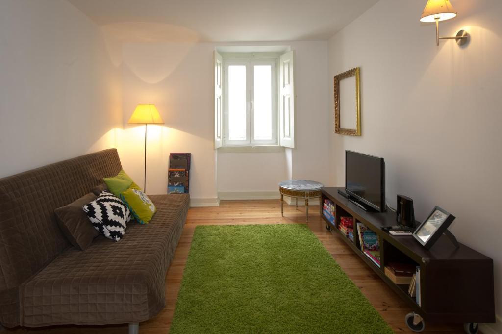 TV a/nebo společenská místnost v ubytování Tram Apartments