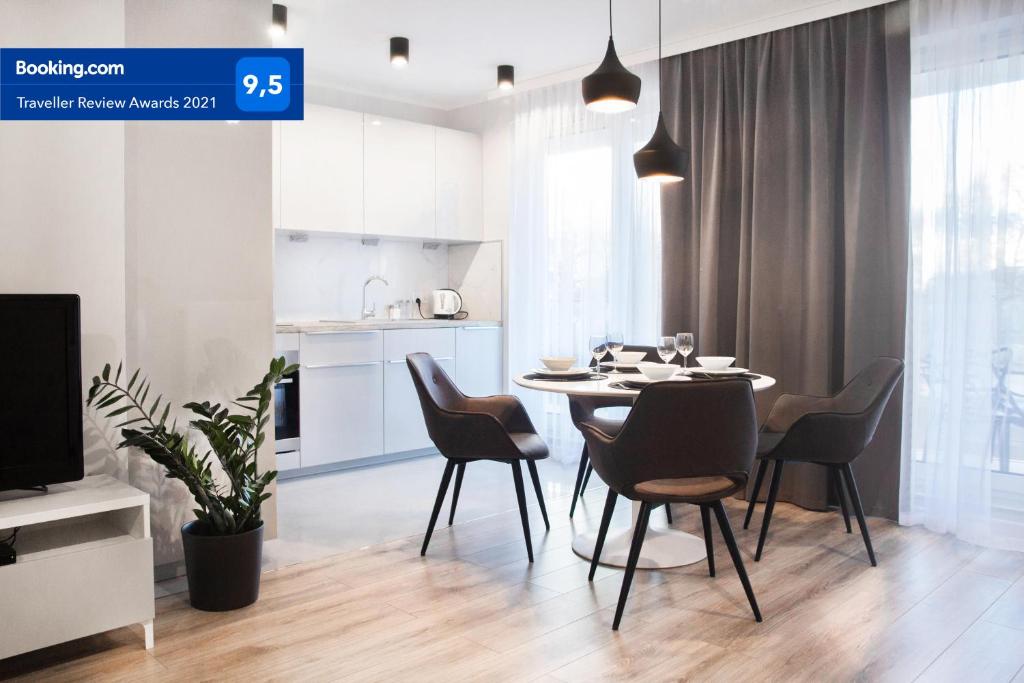 Televízia a/alebo spoločenská miestnosť v ubytovaní RAFA Apartments