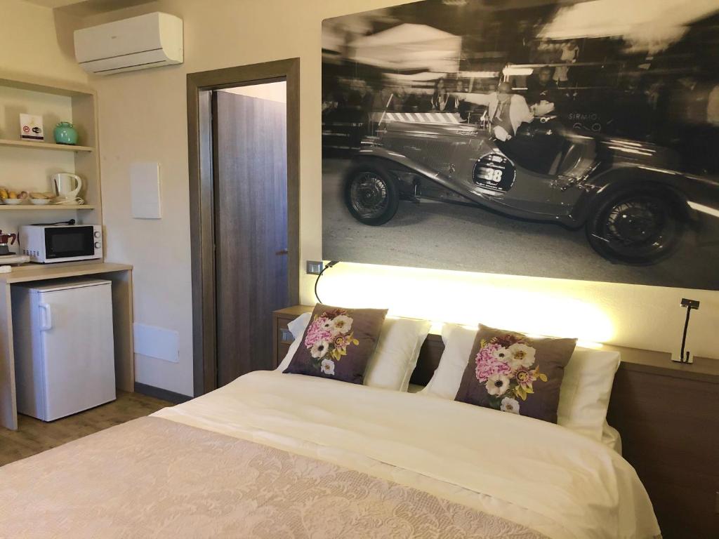 Posteľ alebo postele v izbe v ubytovaní International Rooms & Apartments