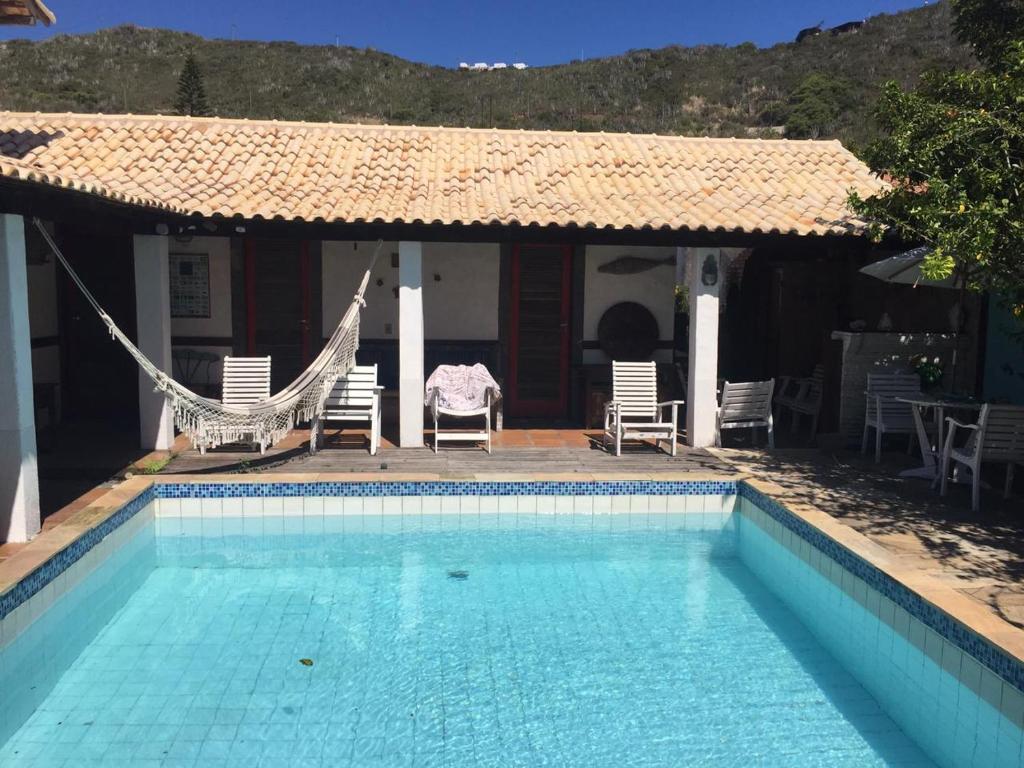  Casa plana com 4 quartos e piscina em Arraial do Cabo