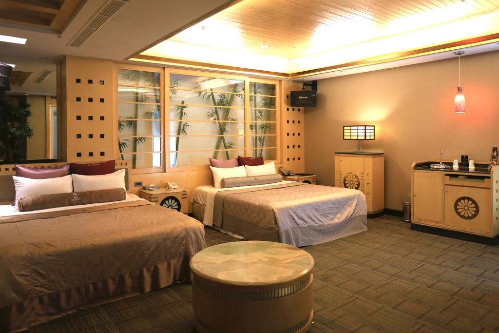 Postel nebo postele na pokoji v ubytování In-stone Motel