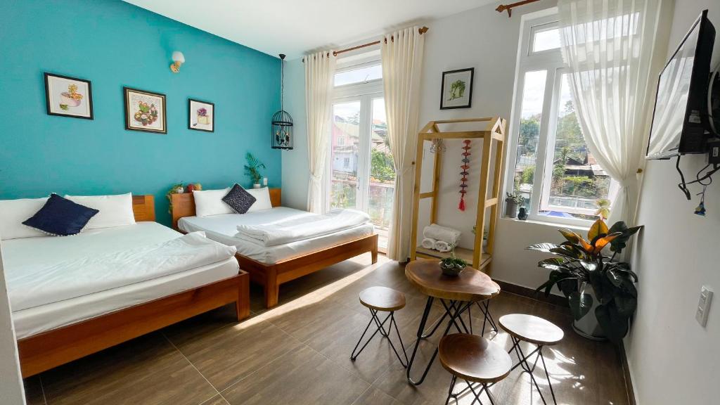 Postel nebo postele na pokoji v ubytování Selena Dalat Homestay