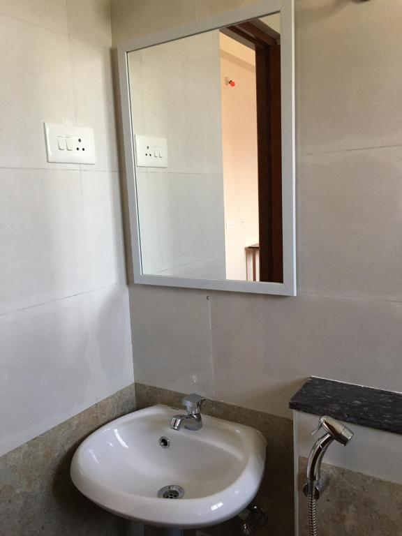 Koupelna v ubytování Shantham Service Apartments, Kinathukadavu, Coimbatore