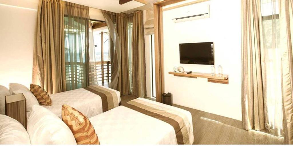 TV a/nebo společenská místnost v ubytování Infinity Resort