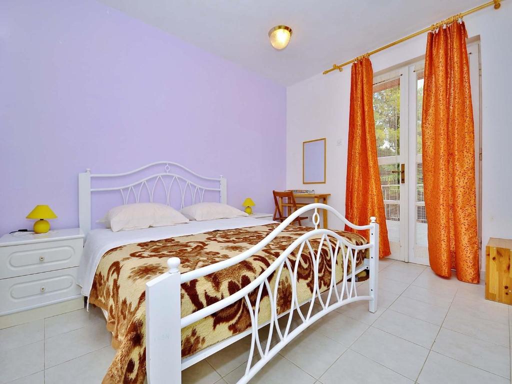Łóżko lub łóżka w pokoju w obiekcie Apartments Miro 636