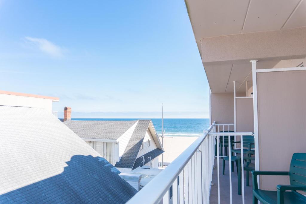 a balcony with a view of the ocean at Comfort Inn Ocean City Boardwalk in Ocean City