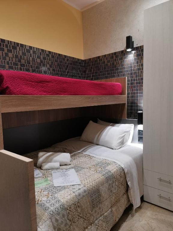 Posteľ alebo postele v izbe v ubytovaní Fratelli Clemente Spa and Hotel
