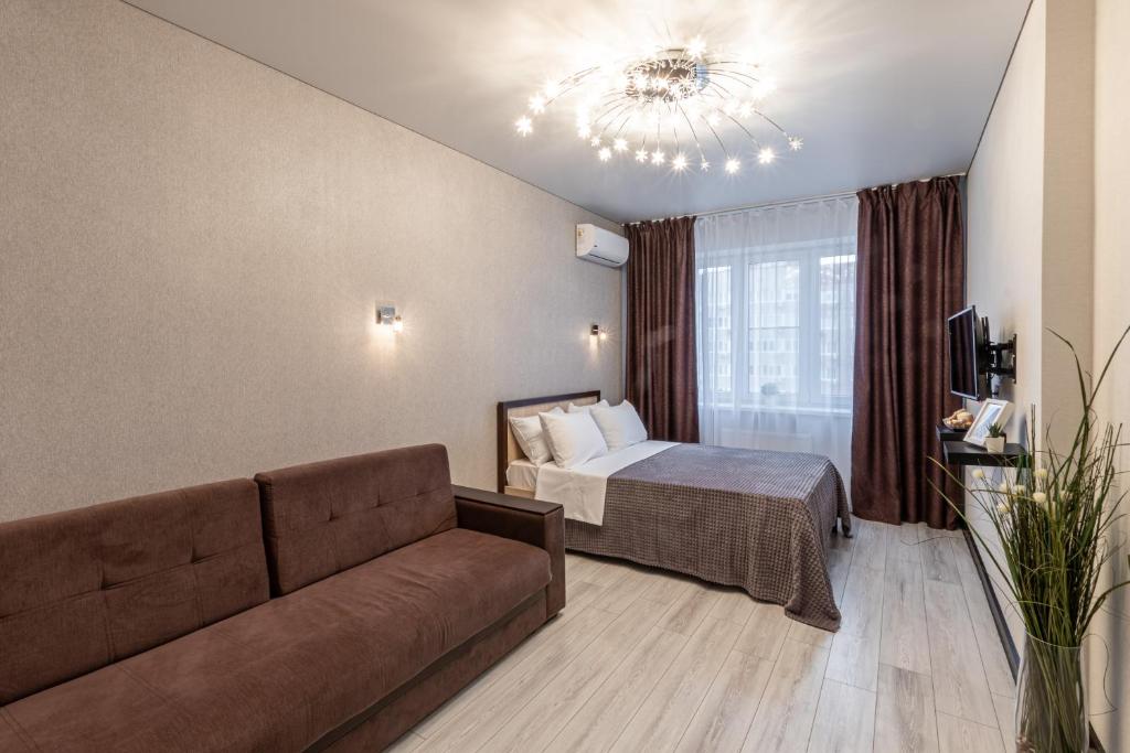 Giường trong phòng chung tại 1 и 2х комнатные апартаменты у Парка Краснодар жк Панорама