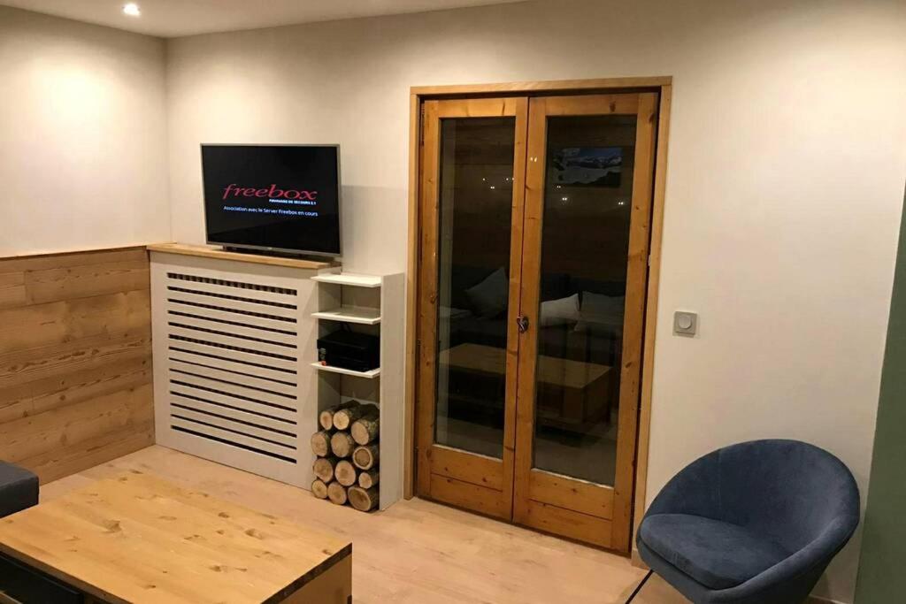 TV a/nebo společenská místnost v ubytování *** Le Refuge *** Logement standing Megève
