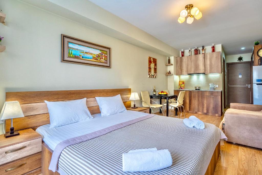 Postel nebo postele na pokoji v ubytování GVC New Gudauri