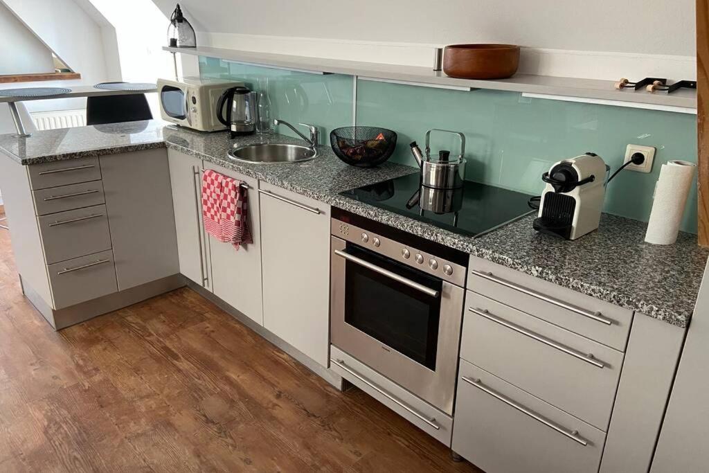 Kuchyň nebo kuchyňský kout v ubytování Terrassen Appartement über den Dächern von Krems