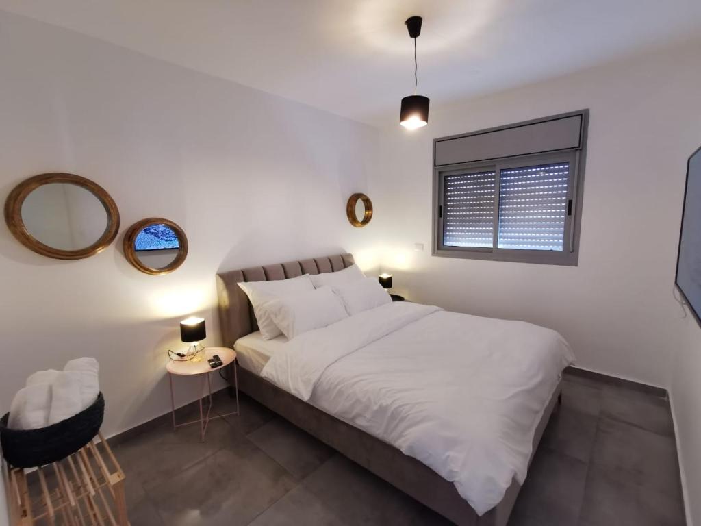 Postel nebo postele na pokoji v ubytování Casa 2 Mitzpe Ramon