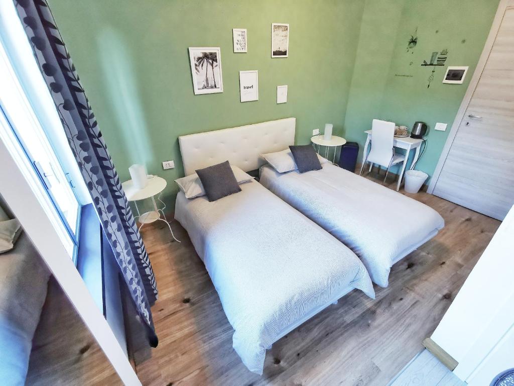 Posteľ alebo postele v izbe v ubytovaní Le Giare B&B