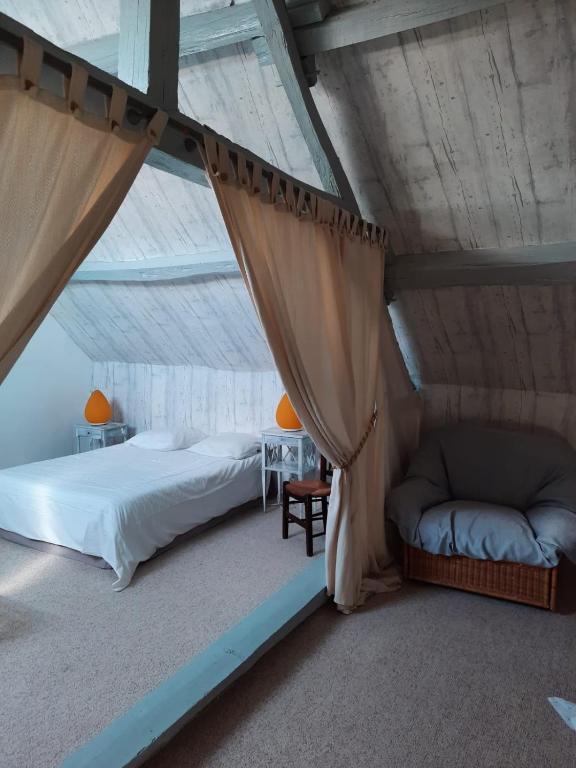 Postel nebo postele na pokoji v ubytování Le Gîte De L'Ouche Charlot