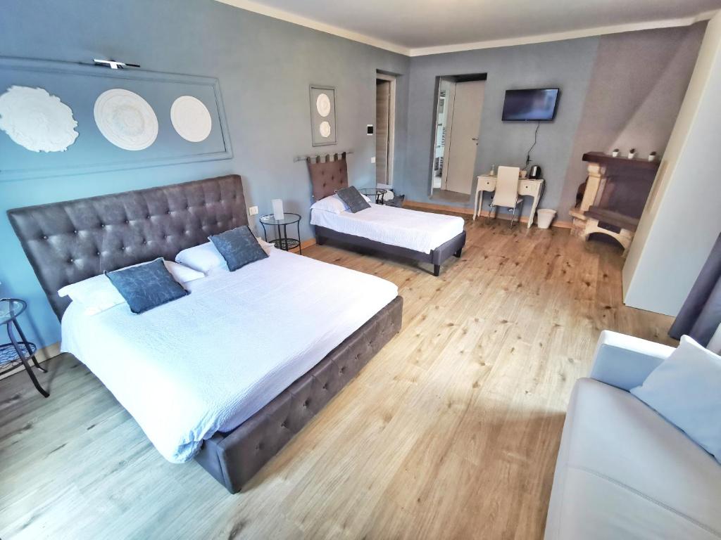 Posteľ alebo postele v izbe v ubytovaní Le Giare B&B