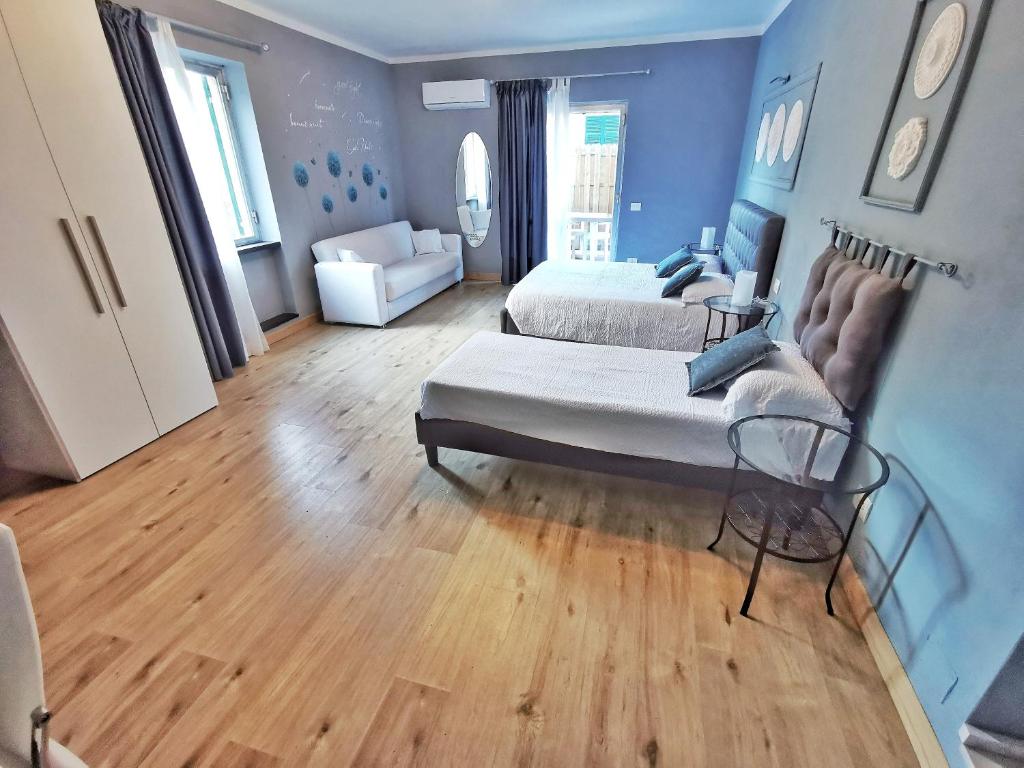 Posteľ alebo postele v izbe v ubytovaní Le Giare B&B