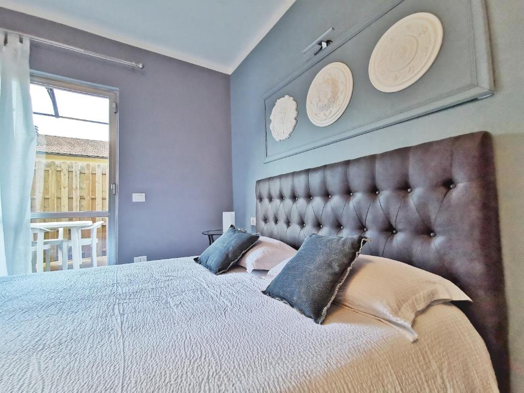 Posteľ alebo postele v izbe v ubytovaní Le Giare B&B