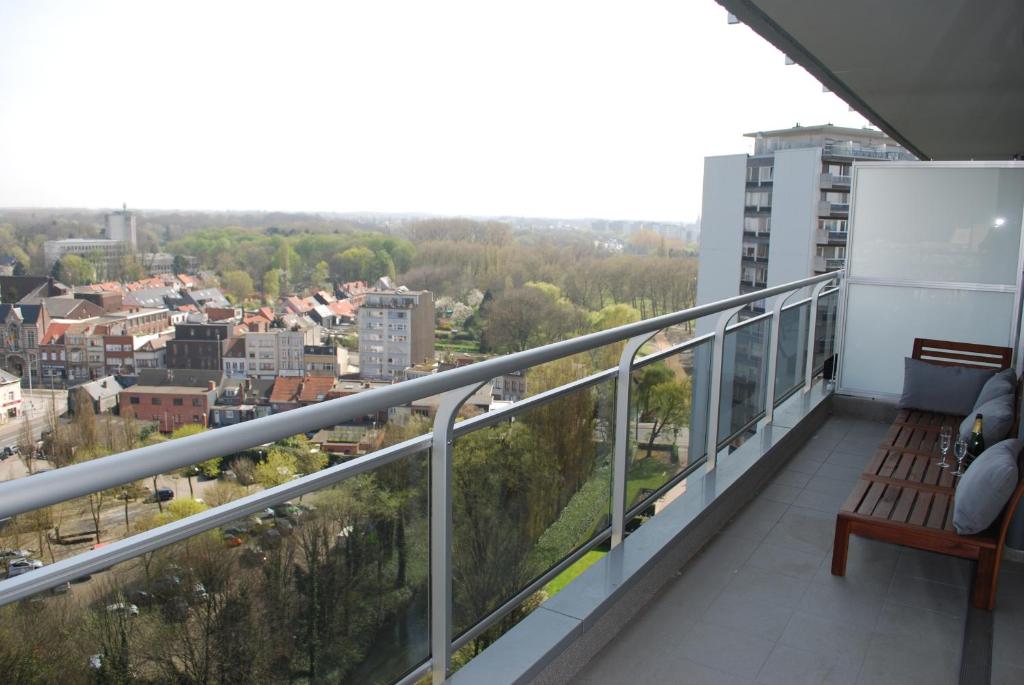 a balcony with a view of a city at Apartment View of Antwerp in Antwerp