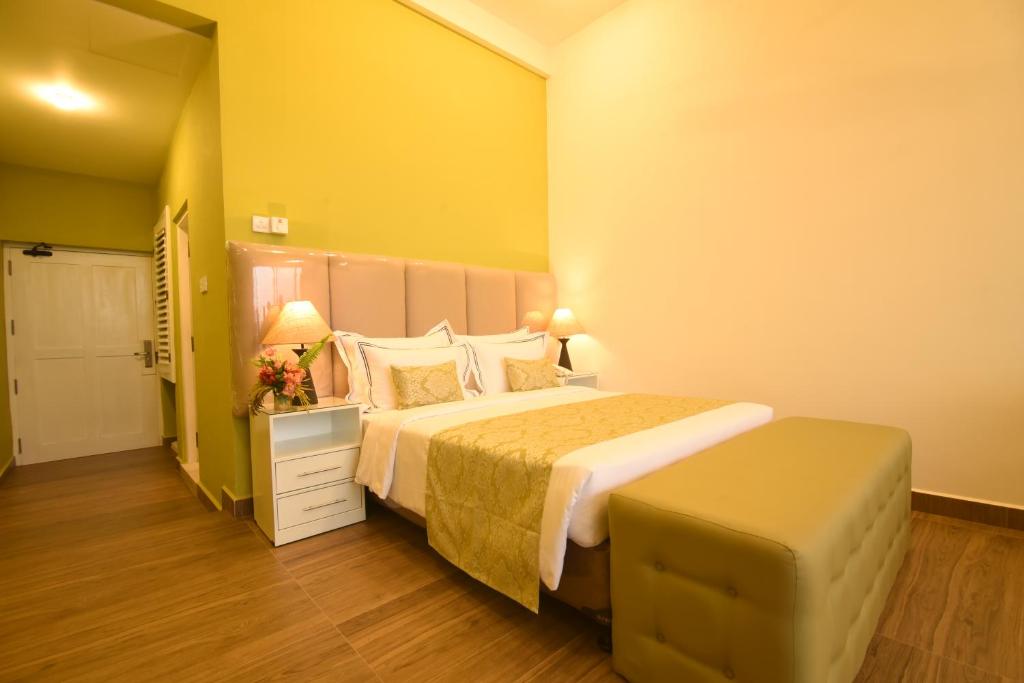 Postel nebo postele na pokoji v ubytování Tip Top Boutique hotel