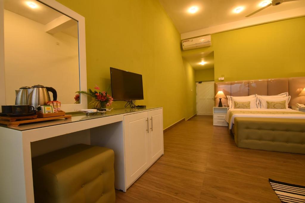 Postel nebo postele na pokoji v ubytování Tip Top Boutique hotel
