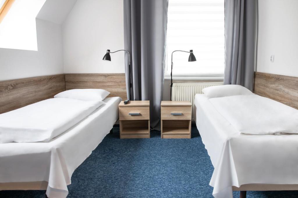 Posteľ alebo postele v izbe v ubytovaní Hotel Górecki