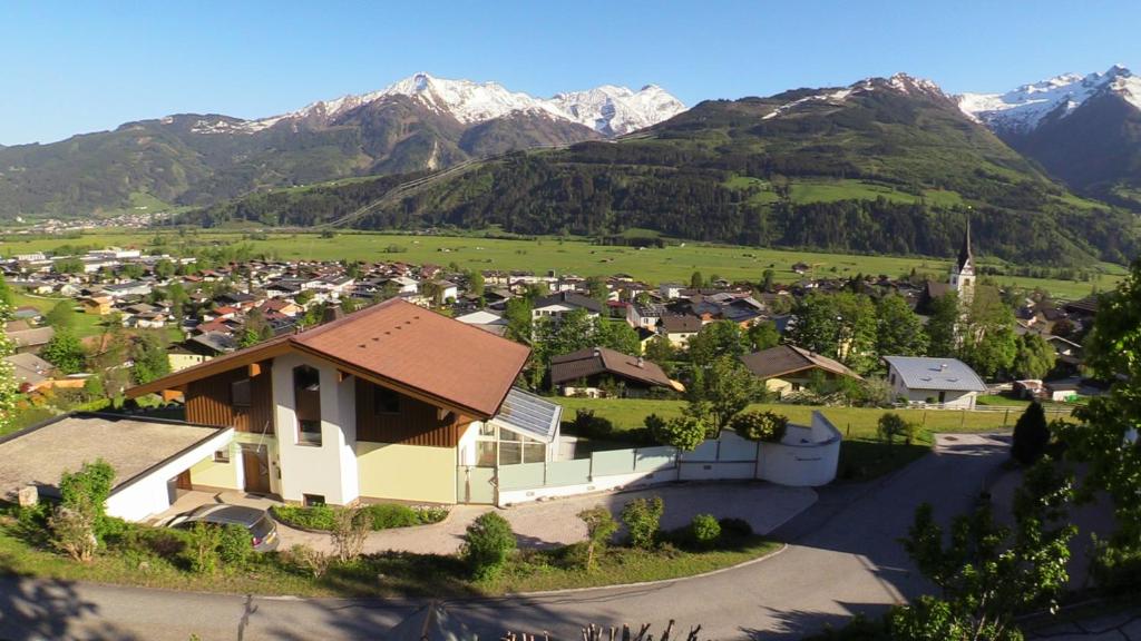 a small village in a valley with mountains at Chalet Sonnenheim in Piesendorf