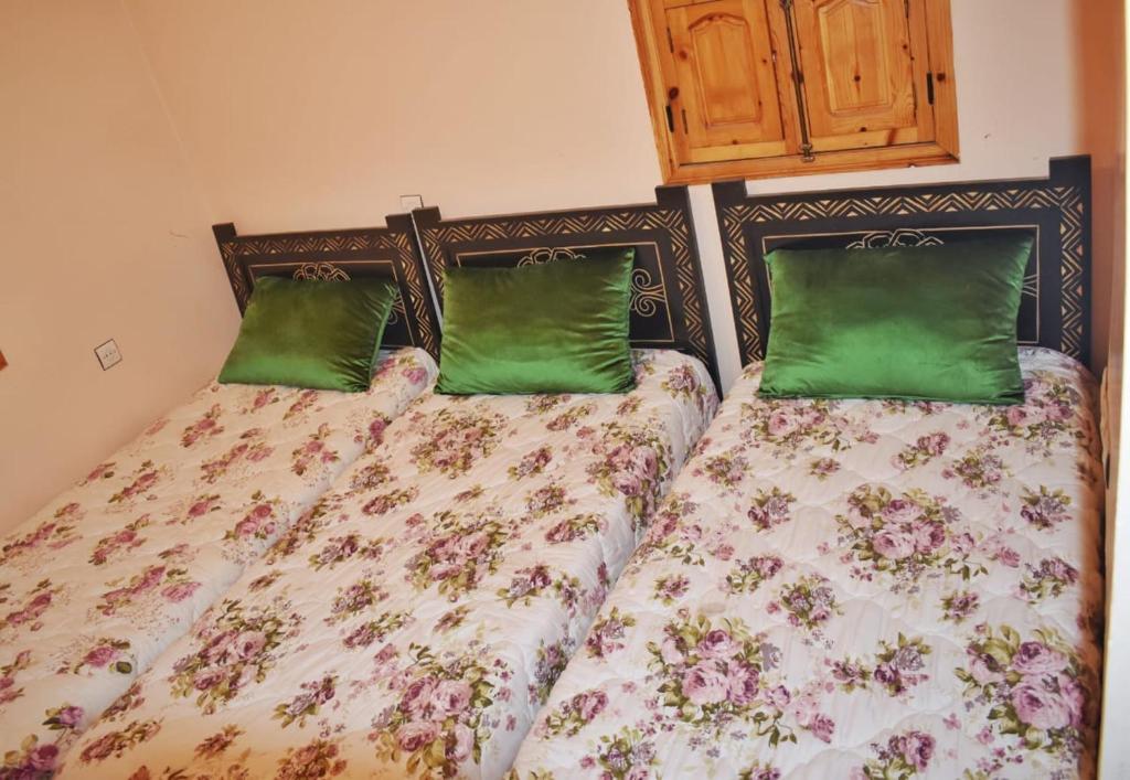 Postel nebo postele na pokoji v ubytování Dar Akiode Toubkal