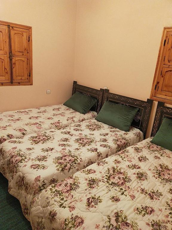 Postel nebo postele na pokoji v ubytování Dar Akiode Toubkal
