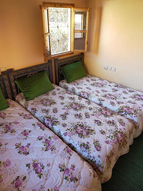 Postel nebo postele na pokoji v ubytování Dar Akiode Toubkal
